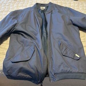 Bomber jacket, it’s been cared for and definitely had a retro look